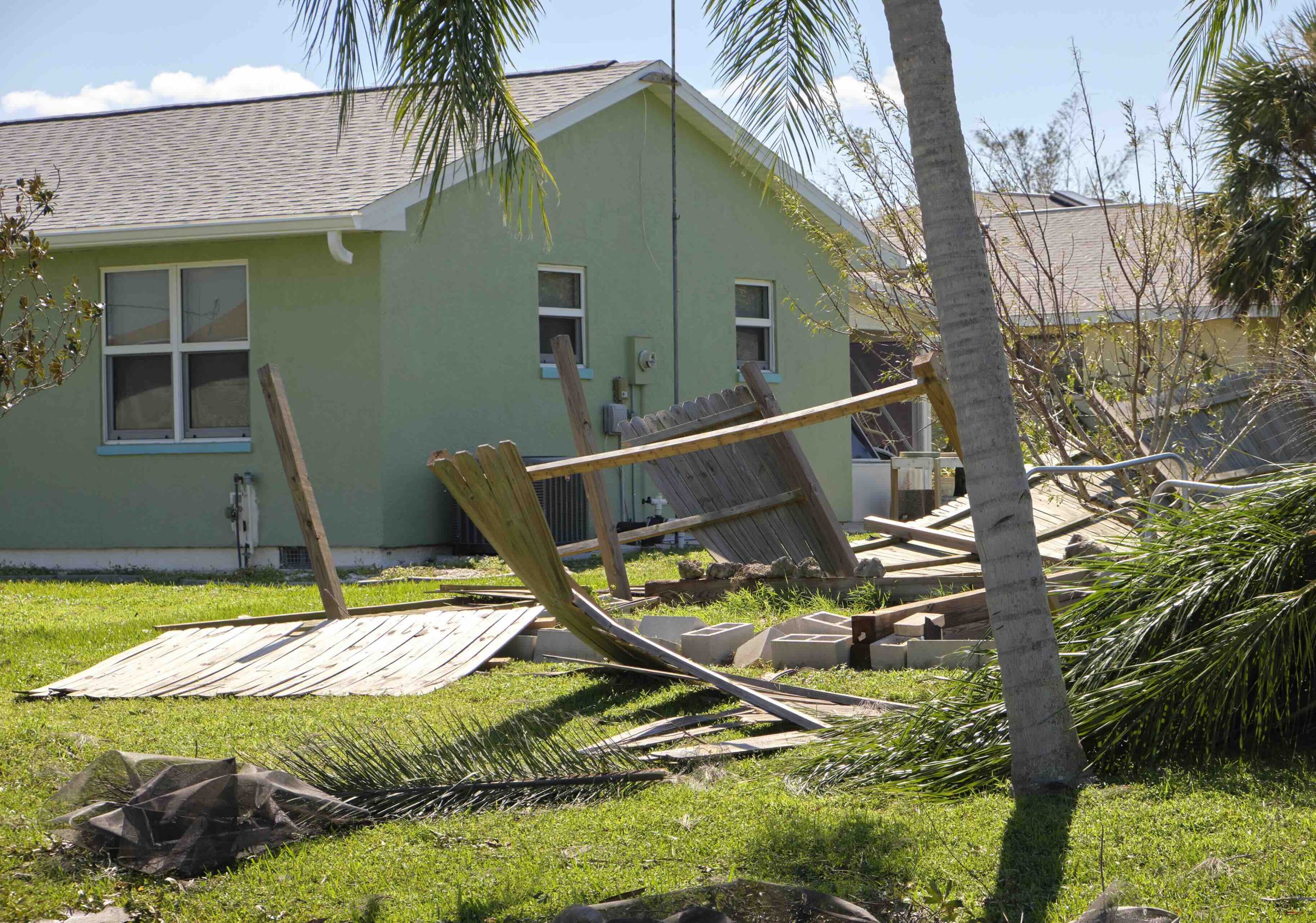 A photo of significant storm debris and damage, demonstrating the need for a dumpster to help with clean up jobs.